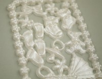 Wachsplatte mit Symbole für Geburt und Taufe Wachsplatte mit Symbole für Geburt und Taufe